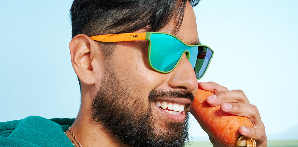24 Carrot Sunnies |green and orange futuristic style sunglasses with green reflective lenses | goodr sunglasses